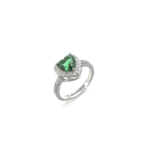 Detailed macro view of heart-shaped green zircon ring with silver adjustable band