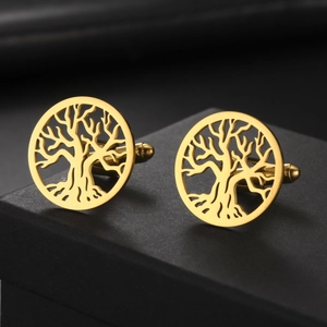 Detailed view of gold tree of life cufflinks on black textured display box