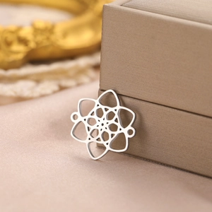 Detailed macro view of silver hollow celtic witch knot jewelry pendant on leather gift box