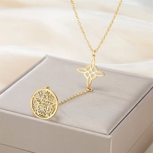 Detailed close-up of golden stainless steel necklace featuring a hollow pentagram pendant