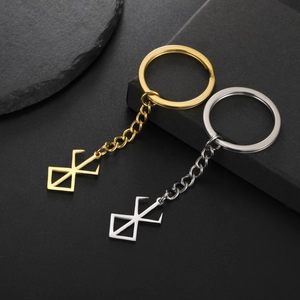 Berserk Brand of Sacrifice keychains in gold and silver finish 304 stainless steel