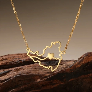 Gold stainless steel necklace with hollowed out Venezuela map pendant and heart accent