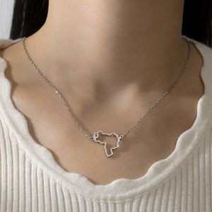 Hollow Africa map pendant necklace in polished 304 stainless steel on a delicate O-chain