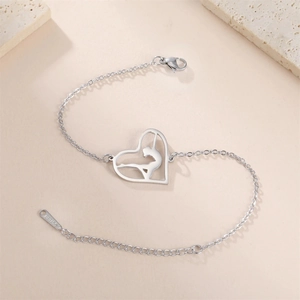 Detail view of heart pendant with ballet dancer on a steel chain with adjustable lobster clasp