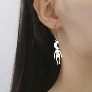 Quirky 304 stainless steel moon-man planet pendant earrings for women on model