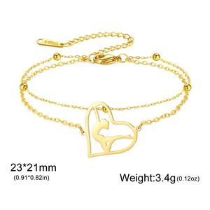 Golden stainless steel heart bracelet featuring a gymnast dancer pendant for women