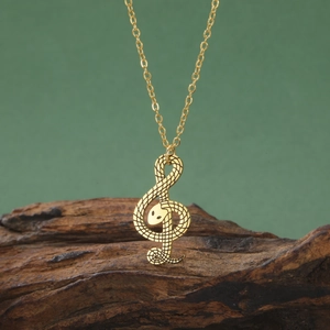 Hip hop 304 roestvrijstalen ketting met slangenhanger en gouden g-sleutel ontwerp