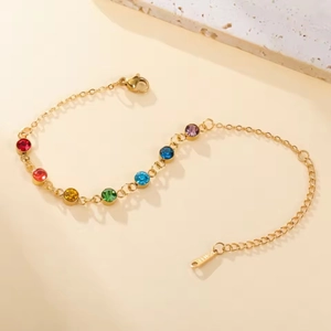 Pulsera de yoga de acero inoxidable dorado con siete piedras de cristal de colores y cierre