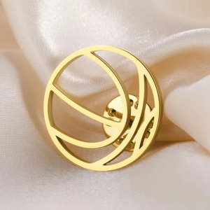 Detailed macro view of the golden round hollow geometric pin with a secure butterfly clutch