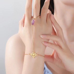 Bohemian gold hand harness with purple amethyst stones and intricate hollow pattern