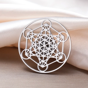 Polished stainless steel Metatron's Cube brooch with cutout sacred geometry design