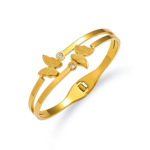 Verstellbares goldene Schmetterling-Armband mit Strasssteinen auf doppeltem Ringband