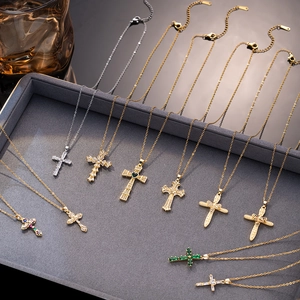 Cross pendant necklaces with colorful cubic zirconia in gold and silver finishes