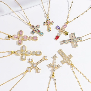 Cross pendant necklaces set with colorful cubic zirconia in polished gold-plated finish