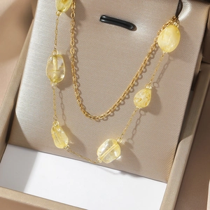 Golden double-layered stainless steel necklace with translucent yellow natural stones