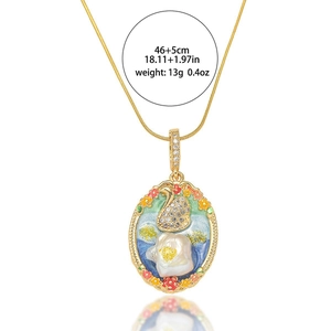 Garden style gold swan necklace with colorful floral enamel and freshwater pearl pendant