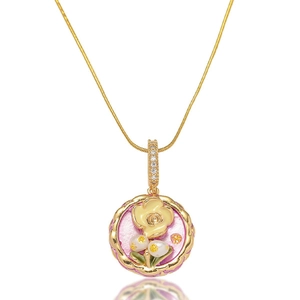 Golden flower pendant necklace with pink background, white pearls and sparkling zircons