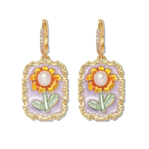 Boucles d'oreilles rétro françaises avec perles, tournesol doré et détails en émail