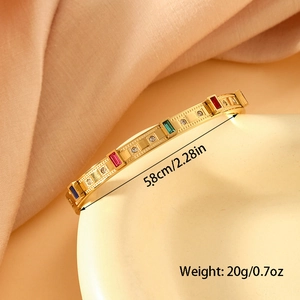 Golden stainless steel bangle with colorful square crystals and 5.8cm inner diameter