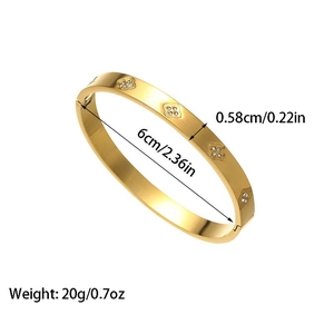Goldenes Kleeblatt Armband mit funkelnden Zirkonia Steinen und polierter Metalloberfläche