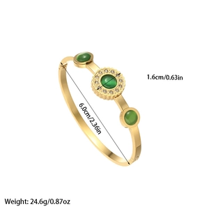 18k gold plated stainless steel bangle with green glass stone and zircon accents