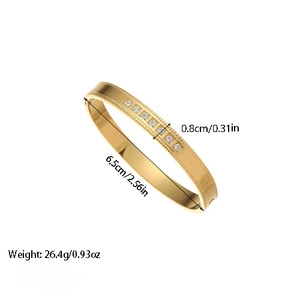 Polished gold titanium steel bangle with seven inset square stones and beaded edges