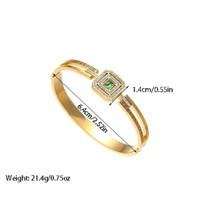 Gold plated titanium bangle with square green emerald and white zircon accents