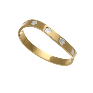 Gouden klaver armband met witte parelmoer inleg en sprankelende zirkonia's