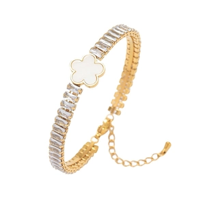 Elegant gold titanium steel bracelet featuring double-row zircons and a white flower charm