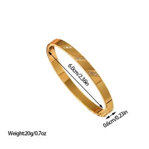 Minimalist gold stainless steel stone-set bangle with 6.0cm diameter and textured finish