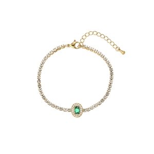 Goldenes Tennisarmband mit ovalem grünem Edelstein und funkelnden Zirkon-Akzenten