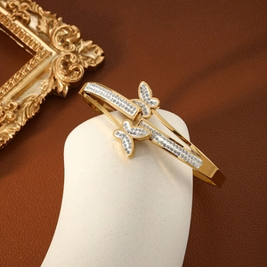 Elegant gold titanium steel butterfly clasp bracelet with sparkling pavé crystals