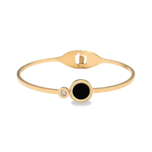 Gold plated stainless steel bangle with black Roman numeral disk and sparkling zircon