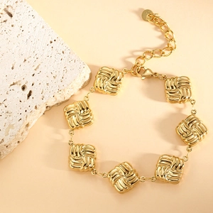 Minimalist gold titanium steel bracelet with geometric square links and lobster clasp
