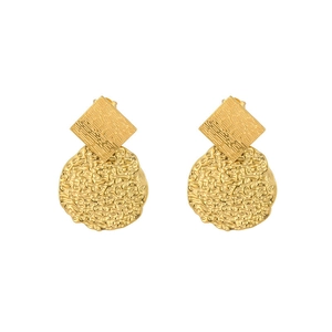 Detail of gold geometric earrings featuring brushed square studs and hammered round pendants