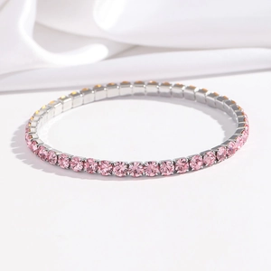 Tennis bracelet in silver finish with circular pink zircons and sparkling crystals