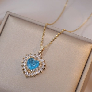 Elegant gold chain heart pendant with sky blue zircon and marquise stones