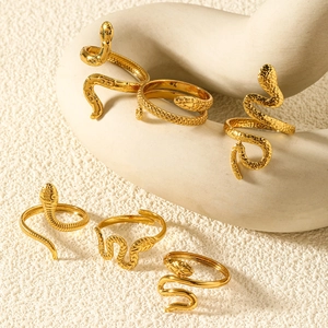 Set of 6 gold stainless steel snake rings with scale texture and polished finish