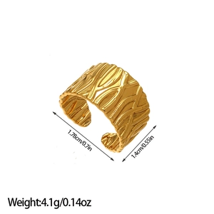 Macro detail of gold 18K titanium ring showing irregular texture and precise dimensions