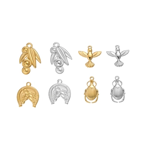 Assorted DIY animal and plant jewelry charms in polished gold and silver finishes