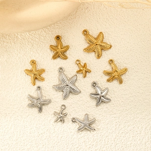 Colgantes de estrella de mar en acero oro y plata con superficie texturizada para joyas