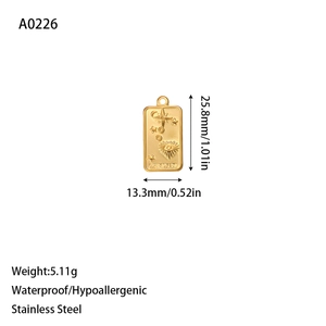 Detail of tarot style gold stainless steel pendant with The Stars engraving and moon