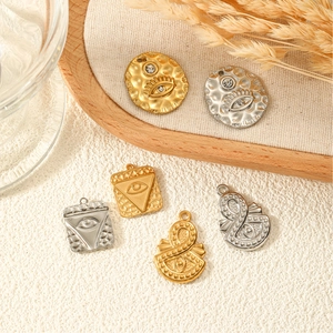 Bohemian style evil eye pendants in gold and silver finish with crystal zircon accents