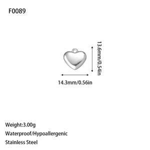 Detailed view of heart-shaped stainless steel charm with waterproof and hypoallergenic specs