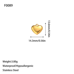 Detailed view of a golden stainless steel heart pendant with measurements and features