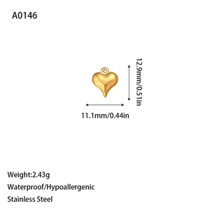 Detailed view of golden stainless steel heart pendant with size and weight specs