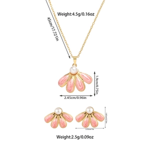 Detail of pink enamel fan-shaped necklace and pearl earrings with size specifications