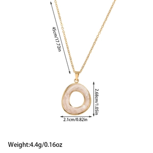 Irregular gold pendant necklace with white enamel inlay, showing dimensions and 45cm length