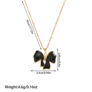 Detailed size specifications for the gold bow pendant necklace with black enamel inlay