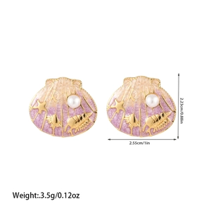 Detailed view of enamel shell earrings with golden starfish decor and pearl accents
